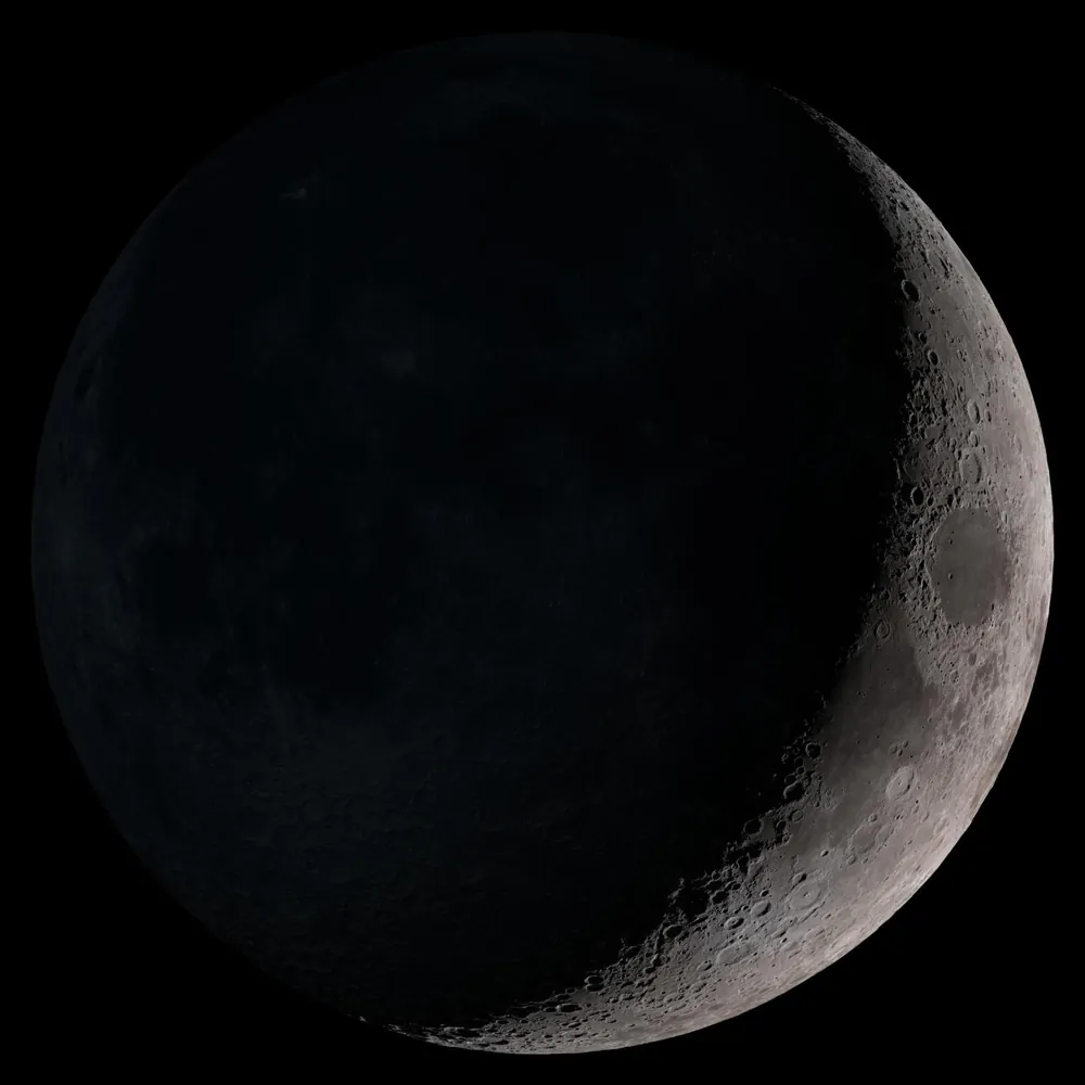 A young Moon as a thin crescent, the start of the synodic month that gives 210.42 Hz
